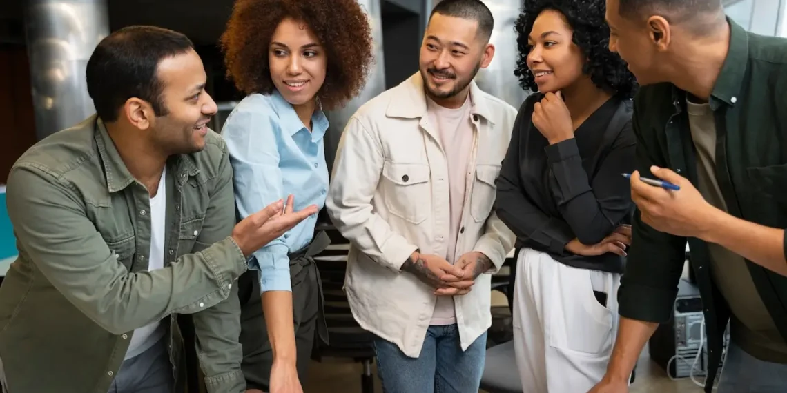 Diverse team members collaborating in a modern office setting, showcasing open communication and mutual respect.