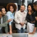 Diverse team members collaborating in a modern office setting, showcasing open communication and mutual respect.