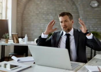 Stressed professional juggling work and personal life.